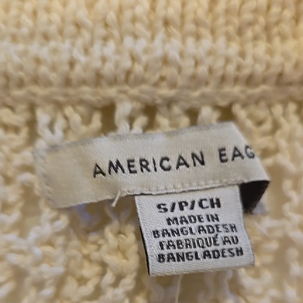 B78. New American Eagle Outfitters Cream Polo Lace Up Knit Sweater Size Small - Picture 2 of 6